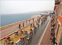  ?? CHRISTOPHE ENA/ASSOCIATED PRESS ?? The pack rides along the seaside Saturday during the first stage of the Tour de France cycling race in Nice, southern France.