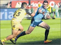  ?? Picture: GALLO IMAGES ?? IN HIS STRIDE: Vince Aso of the Hurricanes tackles the Jesse Kriel of the Bulls during the Super Rugby match between the two teams at the Loftus Versfeld field on Saturday in Pretoria