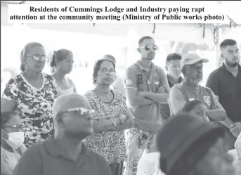  ?? ?? Residents of Cummings Lodge and Industry paying rapt attention at the community meeting (Ministry of Public works photo)