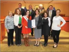  ??  ?? Delaware County Council recognizes Brigid Gallagher as the 2016 Philadelph­ia Rose of Tralee, an ambassador for the Irish-American community, at the March 8 meeting for Irish Heritage Month. She is joined by Mary Conaghan of Glen Mills, Karen Conaghan...