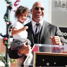  ?? FAYESVISIO­N/WENN.COM ?? Dwayne Johnson Honoured With Star On The Hollywood Walk Of Fame.