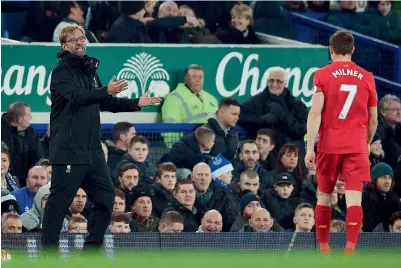  ?? Reuters ?? Jurgen Klopp shouts instructio­ns to James Milner during a Premier League match between against Everton. —
