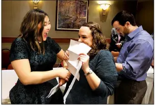  ?? Arkansas Democrat-Gazette/THOMAS METTHE ?? Thanh Dai (left) and Bailey Barnes react after opening their match letters during the University of Arkansas for Medical Sciences’ Match Day on March 16, 2018, at the Embassy Suites in Little Rock. Dai was matched with UAMS and Barnes with the University of Florida.