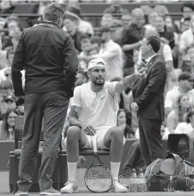  ?? Kirsty Wiggleswor­th/Associated Press ?? Nick Kyrgios complains to an official during his 6-7 (2), 6-4, 6-3, 7-6 (7) upset of fourth-seeded Stefanos Tsitsipas, who said Krygios has “a very evil side.”