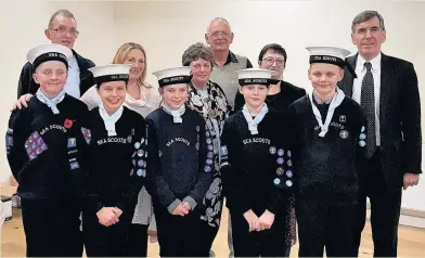  ??  ?? MP David Rutley visited the 15th Macclesfie­ld Sea Scouts group to celebrate its 50th birthday