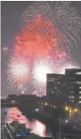  ?? HERALD FILE PHOTO ?? LIBERTY’S LIGHT: Fireworks seen over the Charles River.