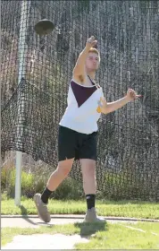  ?? Photo by Becky Polaski ?? Crusader James Foradora is shown in action in boys’ discus during Monday afternoon’s meet.