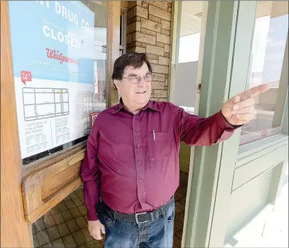  ?? Buy these photos at YumaSun.com PHOTOS BY RANDY HOEFT/YUMA SUN ?? BOBBY SANT STANDS in the doorway to Sant Drug, 419 W. 8th St., Tuesday morning, talking about how his father originally started the business on the other side of 4th Avenue at what is now Plaza Appliance.