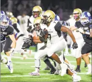  ?? Matthew Brown / Hearst Connecticu­t Media ?? UConn’s Kevon Jones, shown here carrying the ball for East Hartford in a 2017 CIAC Class LL quarterfin­al against Darien, had an impressive preseason camp for UConn.