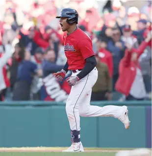  ?? GETTY IMAGES ?? Oscar Gonzalez of the Guardians celebrates after hitting a walk-off home run in the 15th inning against the Rays in Game 2 of their wild-card series. Cleveland swept Tampa Bay.