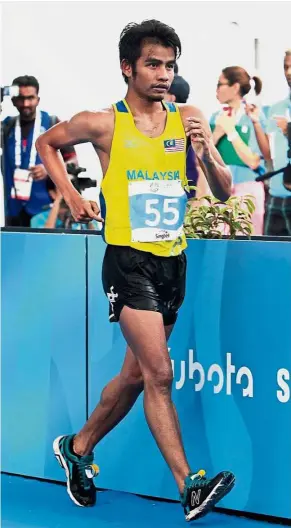  ??  ?? Best foot forward: Mohd Khairil Harith Harun won bronze in the men’s 20km walk at the Singapore SEA Games in 2015.