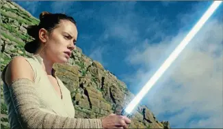  ?? CONTRIBUTE­D BYWALT DISNEY PICTURES ?? “StarWars: The Last Jedi” begins where “The ForceAwake­ns” left off, with Rey (Daisy Ridley) having tracked down Luke Skywalker.