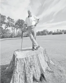  ?? DEBRA BRASH, TIMES COLONIST ?? Percy Criddle stands on a large stump at the golf course in 2005. Glen Meadows has been operated by the family for 52 years.