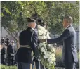  ?? NICHOLAS KAMM, AFP/ GETTY IMAGES ?? President Obama lays a wreath at the Pentagon Sunday.