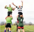  ?? Photo / Glenn Taylor ?? In 2012, deputy principal Wayne Wooster (right) a former Magpie and former Magpies coach jumped in a line-out against Magpies lock Ross Kennedy.