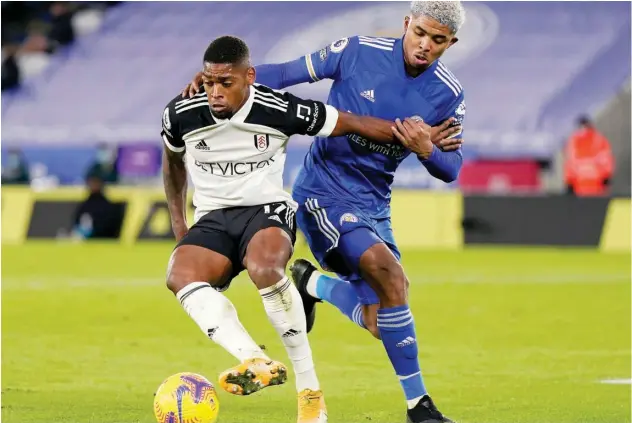  ?? Associated Press ?? ↑ Fulham’s Ivan Cavaleiro (left) vies for the ball with Leicester’s Wesley Fofana during their English Premier League match on Monday.