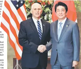  ??  ?? Pence (left) shakes hands with Abe upon his arrival at the prime minister’s official residence in Tokyo.