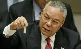  ?? Photograph: Ray Stubblebin­e/Reuters ?? Colin Powell holds up a vial during his presentati­on to the UN security council in New York on 5 February 2003.