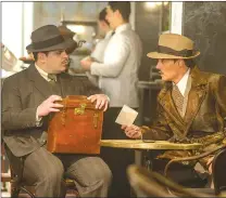  ??  ?? This image released by Twentieth Century Fox shows Josh Gad, left, and Johnny Depp in “Murder on the Orient Express.”