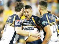  ??  ?? Double: Folau Fainga’a helped Brumbies to victory