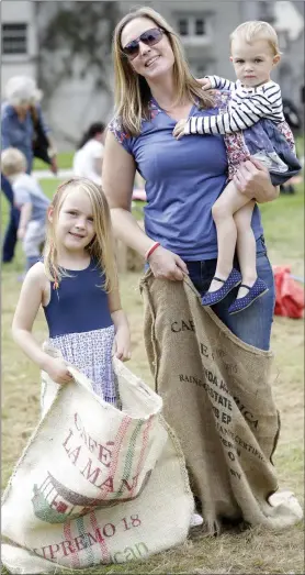  ??  ?? Isla, Anne and Lilymae Hampson in the sack races.