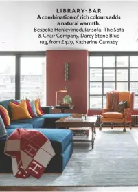  ??  ?? LIBRARY-BAR A combinatio­n of rich colours adds a natural warmth.
Bespoke Henley modular sofa, The Sofa & Chair Company. Darcy Stone Blue rug, from £429, Katherine Carnaby