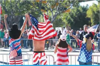  ??  ?? CALIFORNIA: Right-wing ‘Patriot Picnic’ chant during a demonstrat­ion at Chicano Park on February 3, 2018 in San Diego. —AFP