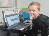  ?? PVNC PHOTO ?? Mattias Wojtowicz, in his home classroom on Buckhorn Lake, is learning through the virtual program provided by Peterborou­gh Victoria Northumber­land Clarington Catholic School Board.