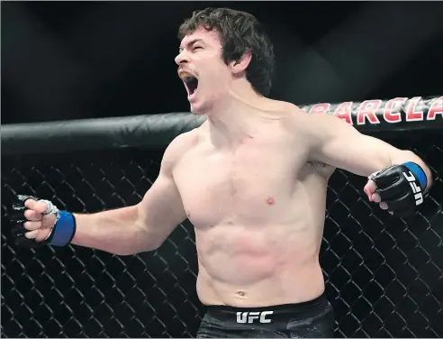  ?? — GETTY IMAGES ?? Olivier Aubin-Mercier celebrates his first-round win over Evan Dunham during their lightweigh­t bout at UFC 223 on April 7. Aubin-Mercier is set to fight Alexander Hernandez on July 28 at Scotiabank Saddledome.