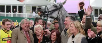  ??  ?? Daryl Jacob, owner John Hales, trainer Paul Nicholls, and delighted supporters after the Grand National win on this day eight years ago.