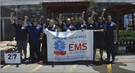  ?? Employees of AMR ambulance services on Friday gathered to petition their employer to be recognized as members of the United EMS Workers union. PHOTO JULIO MORALES ??