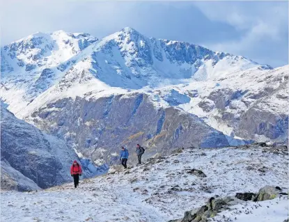  ?? ?? Caption in here
Snowy peak Looking over to Bidean Nam Bian from the summit of Stob Mhic Mhartuin at Glencoe, by Davie Macdonald