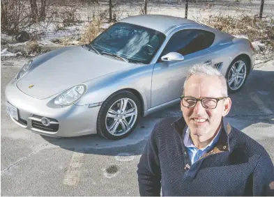  ?? PETER J THOMPSON / NATIONAL POST ?? Jonathan Kay's love of the Porsche 911 began with a father-and-daughter Lego project. After explaining the intricacie­s of its six-cylinder boxer engine, he found himself wandering into a dealership and writing a cheque.