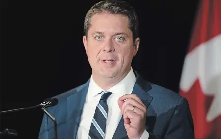  ?? CHRIS YOUNG THE CANADIAN PRESS ?? Conservati­ve Leader Andrew Scheer said that when it comes to same-sex marriage and abortion laws in Canada, he “will not reopen this debate.”