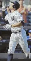  ?? ap pHOTO ?? GOOD JOB, KID: Aaron Judge celebrates after hitting his 50th home run in the Yankees’ win yesterday to set a record for rookies.