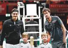  ?? AFP ?? Robin Haase (right) with Roger Federer ahead of their quarter-final match-up at the ABN AMRO World tournament in Rotterdam earlier this month.