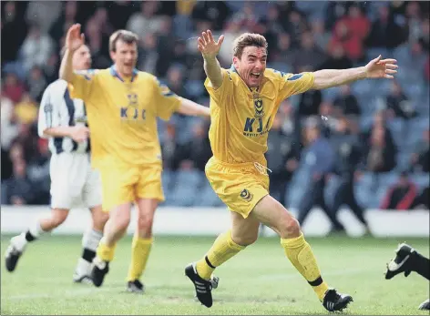  ?? Picture: Pete Langdown ?? WINNER John Durnin celebrates the first of his two Pompey goals in a 2-2 draw at West Brom in April 1999.