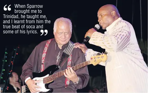  ?? FILE ?? Byron Lee (left) performing with calypsonia­n Mighty Sparrow. When Sparrow brought me to Trinidad, he taught me, and I learnt from him the true beat of soca and some of his lyrics.