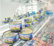  ?? SEKSAN ROJJANAMET­AKUN ?? Canned tuna products of Thai Union Group, the world’s biggest tuna exporter. Thailand’s canned tuna exports are set to grow as demand surges.