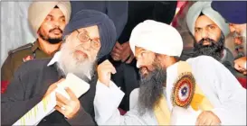  ?? PARDEEP PANDIT/HT ?? Chief minister Parkash Singh Badal having a word with Baba Malkiat Singh at Khiala village in Jalandhar district on Sunday.
