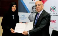  ?? Supplied photo ?? Waqar ahmad and Dr khawla al saadi during the signing of the memorandum of understand­ing. —