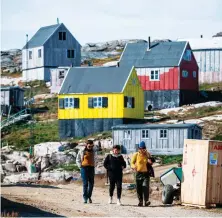  ?? AFP ?? Residents in the village of Kulusuk welcome extra tourist revenue, but some worry about the effect of rising visitor numbers on the region’s wilderness.