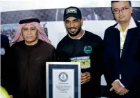  ?? Supplied photos ?? A convoy of Dubai Police and media persons accompany the stunt man’s daredevil act. Extreme right: Captain Abdulla with some officials after winning the Guinness fete. —