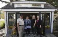  ?? SUBMITTED PHOTO ?? Meredith Jacks, second from the left, stands in front of her new custom She Shed, built by a team at Rotelle Studio(e) as part of a competitio­n. Jacks won the shed in a raffle, but before she takes ownership, Jacks proposed a donation collection to benefit Home of the Sparrow of Exton. Shown in this photo, left to right are: Jacks’ father Ken Styer, Jacks, and Styer Realtors Diane Zeleski and Liesel Tarquini.