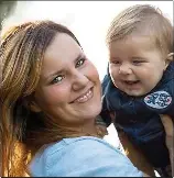  ??  ?? loSS: Anna kisses baby Karol’s white coffin, left, and, above, with her little boy