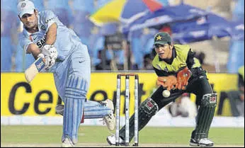  ?? AFP ?? Over the years, Sarfraz Ahmed and MS Dhoni became prominent faces in Indiapakis­tan games.