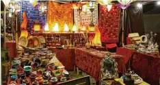  ?? Foto: Conrad Rössel ?? Authentisc­hes Markttreib­en mit afrikanisc­hen Textilien, Kunsthandw­erk, Schmuck und Musikinstr­umenten gibt es in Birkenried.