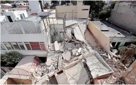  ?? ?? AL DíA SIGUIENTE. La vista del derrumbe en Providenci­a, desde una vivienda ubicada en Agustín González de Cossío.