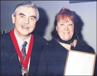  ??  ?? Pictured, Rosemary Williams, in the mid-1990s, receiving her Echo New Year’s Honour for her fund-raising and support to the community from the-then Deputy Mayor Coun John Hawkes