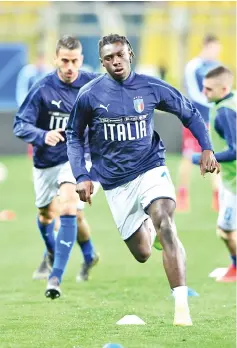  ?? — AFP photo ?? Italy’s forward Moise Kean (C) warms up prior to the Euro 2020 Group J qualifying football match Italy vs Liechtenst­ein on March 26, 2019 at the Ennio-Tardini stadium in Parma.